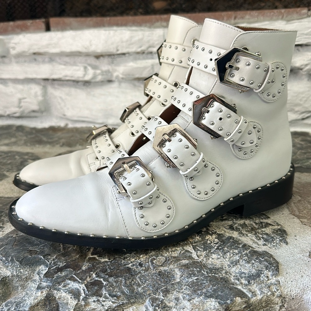Givenchys iconic White Buckle Boot. Barely worn. Great condition.
